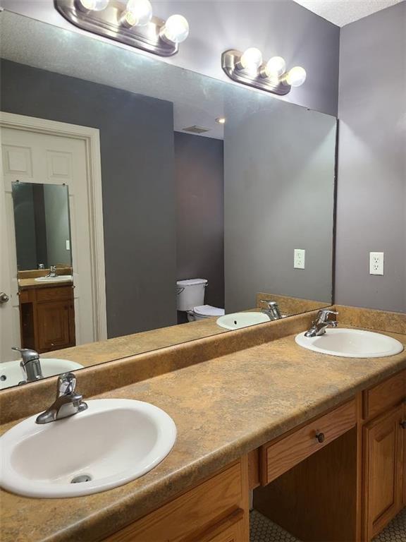 805 Gose Road Forsyth, GA 31029 - Photo 14 of 29 a bathroom with a sink and a mirror