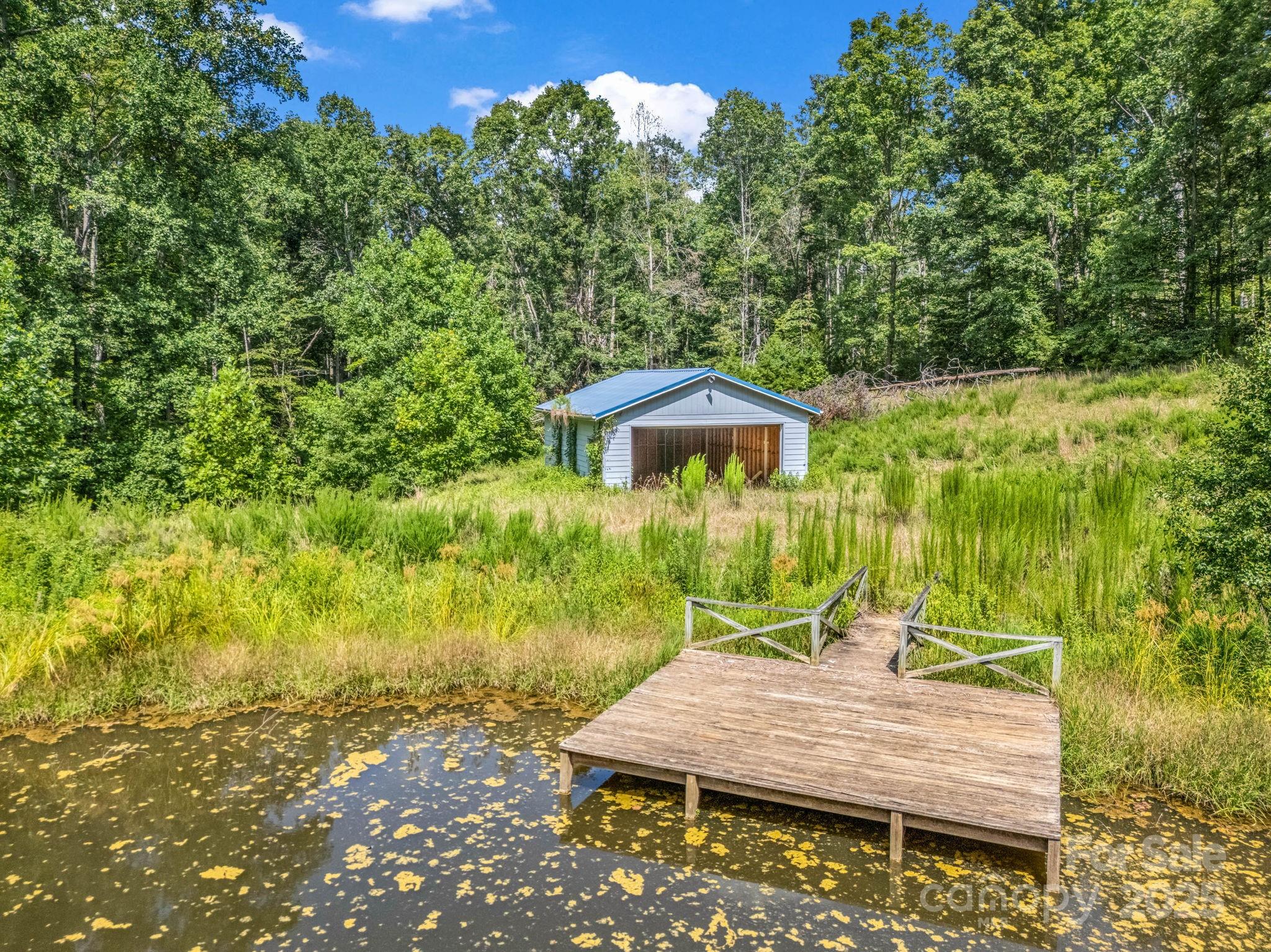 0 Us 64/74a Highway Rutherfordton, NC 28139 - Photo 18 of 37 a view of a wooden dinning table and chairs in patio