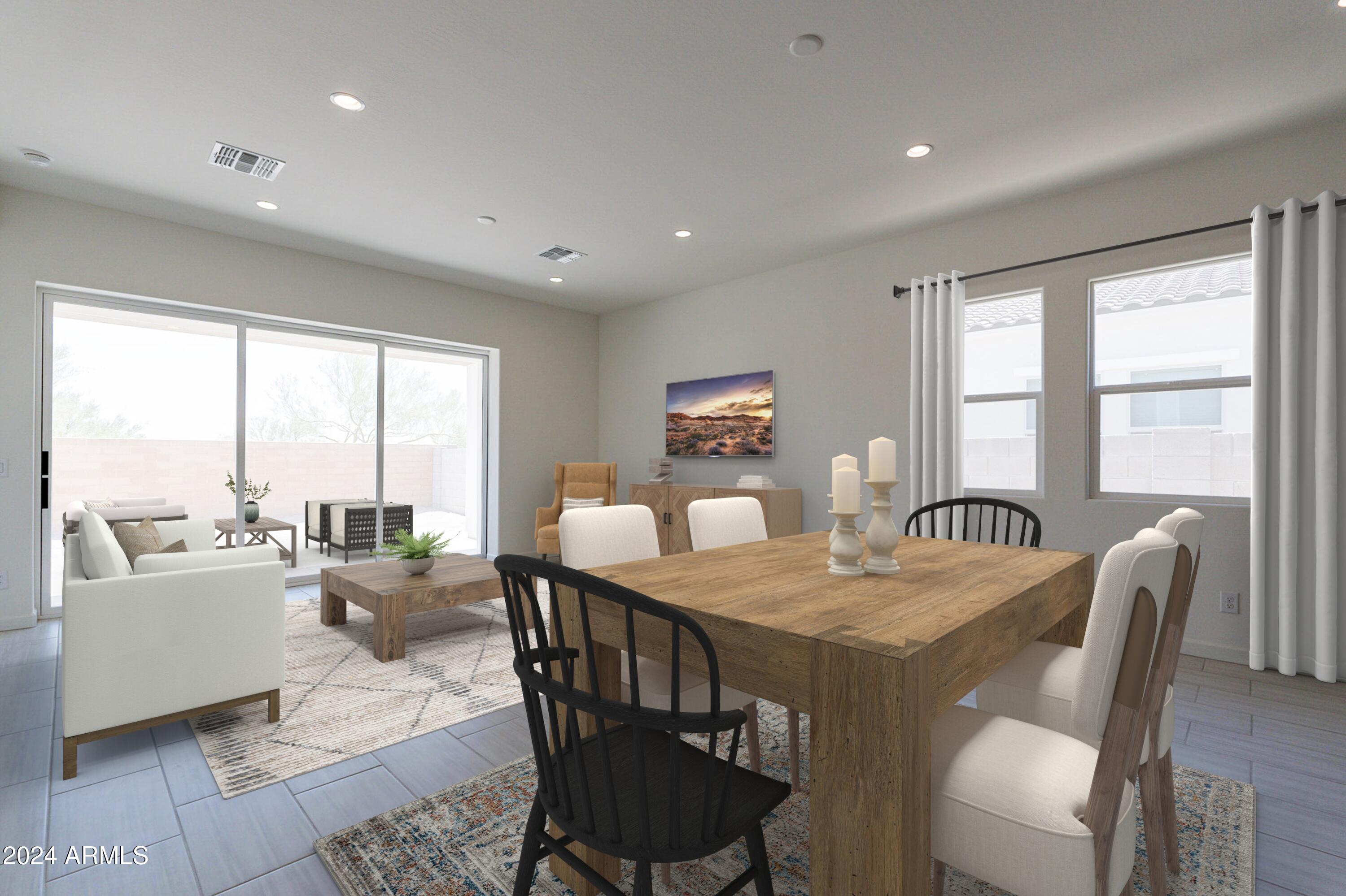 18023 West Long Lake Road Goodyear, AZ 85338 - Photo 1 of 36 6608_AZ_CHAPIN-104_STAGING_GREAT-ROOM_FI