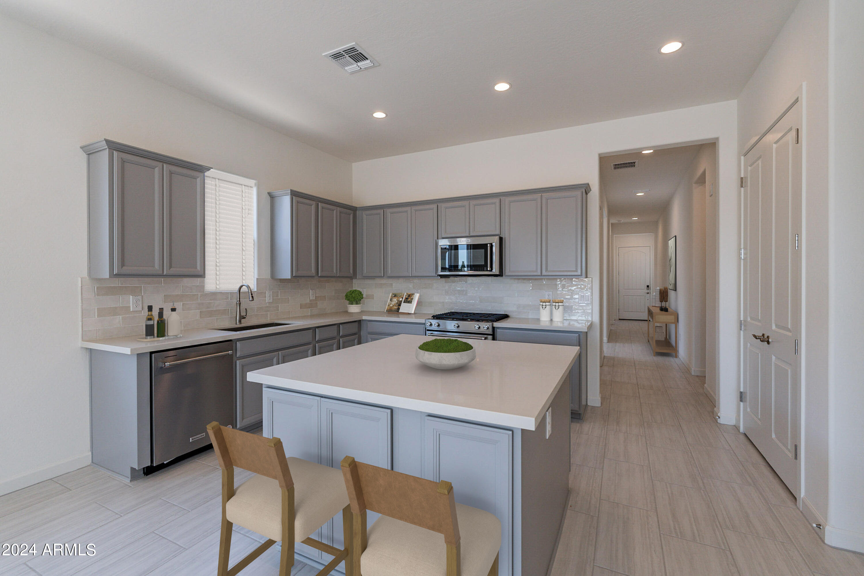 18023 West Long Lake Road Goodyear, AZ 85338 - Photo 5 of 36 6608_AZ_CHAPIN-104_STAGING_KITCHEN_FINAL