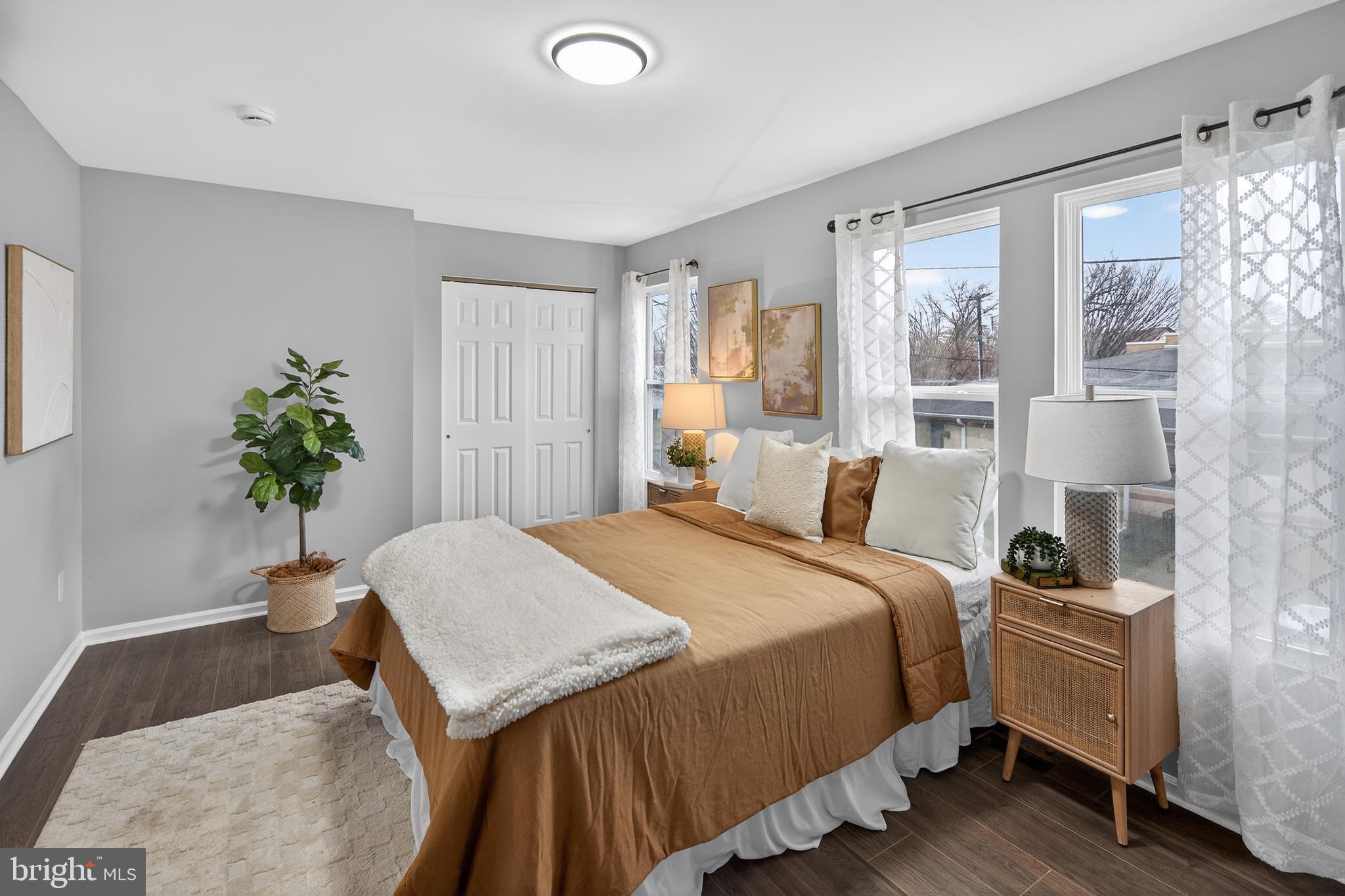 474 St Mary Street Burlington, NJ 08016 - Photo 13 of 30 a bedroom with a bed and a potted plant