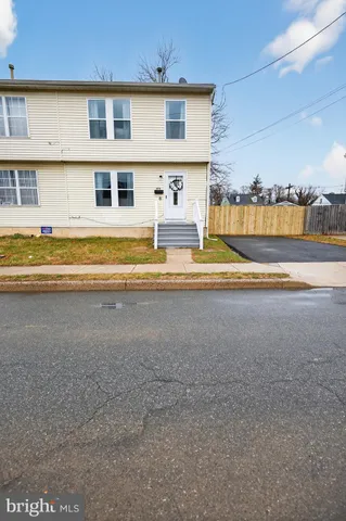 a view of pool with ocean view