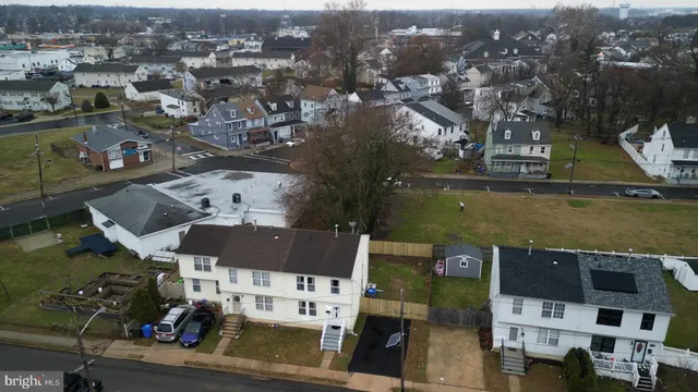 an aerial view of a house with a lake view