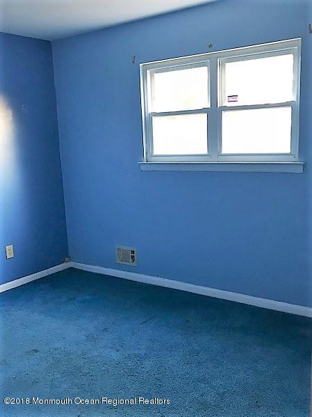 534 Line Road Hazlet, NJ 07730 - Photo 13 of 21 an empty room with a window