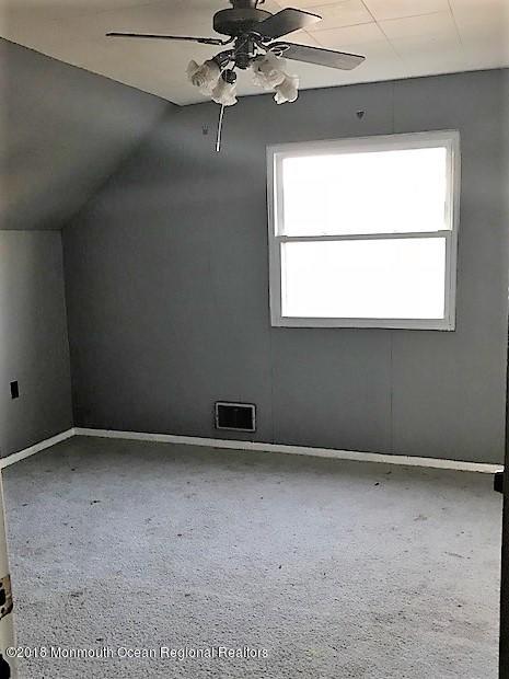 534 Line Road Hazlet, NJ 07730 - Photo 15 of 21 an empty room with a window