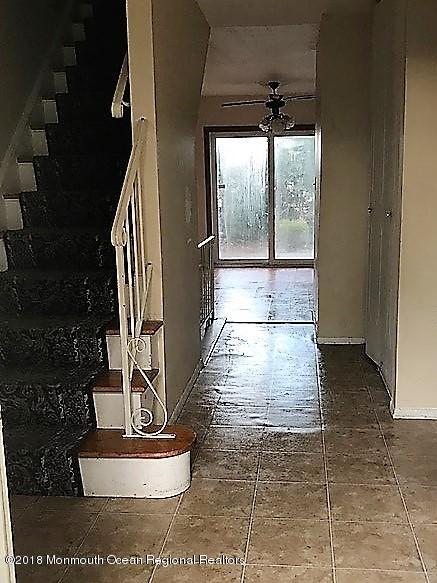 534 Line Road Hazlet, NJ 07730 - Photo 2 of 21 a view of entryway and hall with wooden floor