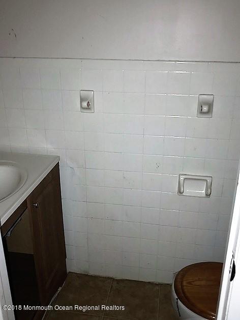 534 Line Road Hazlet, NJ 07730 - Photo 8 of 21 a bathroom with a sink
