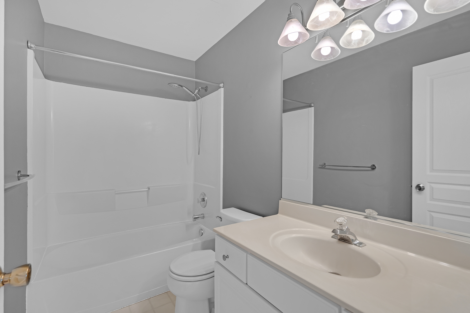 148 Locksley Drive Streamwood, IL 60107 - Photo 13 of 20 a bathroom with a sink a toilet and shower