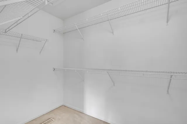 a view of a room with racks on the wall