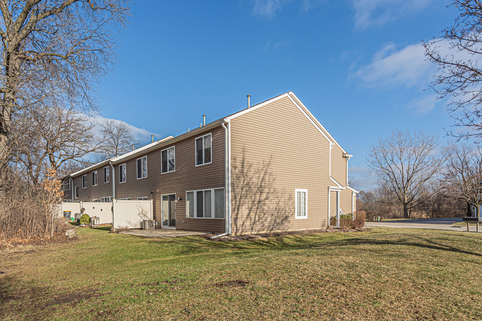 148 Locksley Drive Streamwood, IL 60107 - Photo 18 of 20 a view of a house with a yard