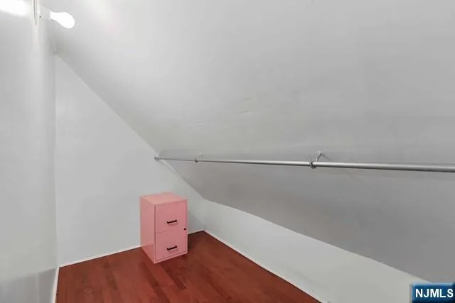 a view of a room with racks on the wall