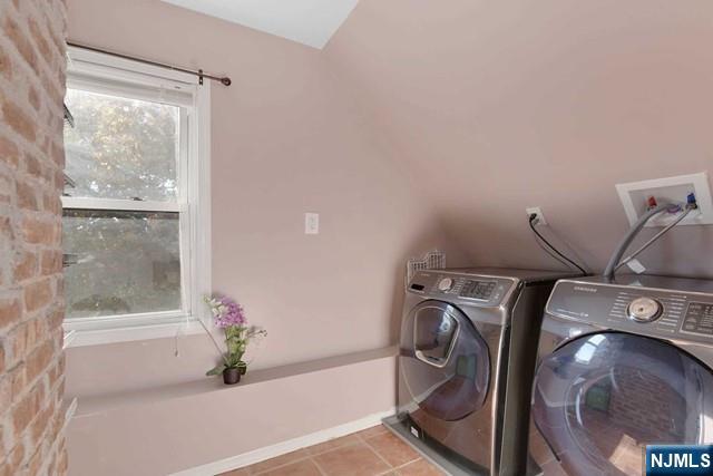 23 Donaldson Avenue, Unit 2 Rutherford, NJ 07070 - Photo 29 of 32 a utility room with dryer and washer
