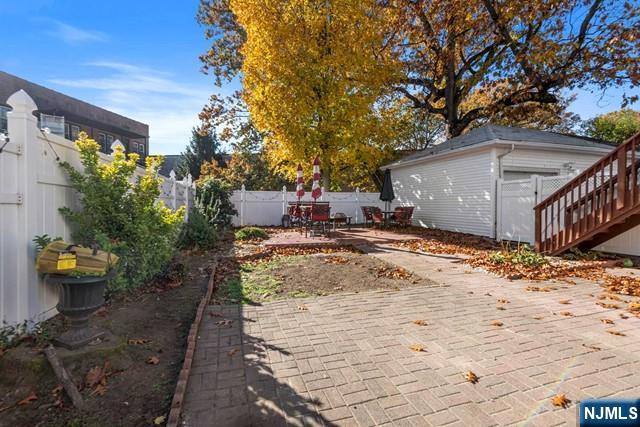 23 Donaldson Avenue, Unit 2 Rutherford, NJ 07070 - Photo 31 of 32 a view of a backyard with sitting area