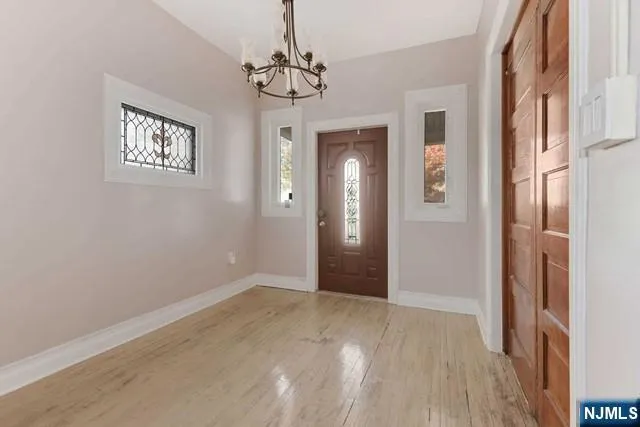 a view of a hallway with entryway