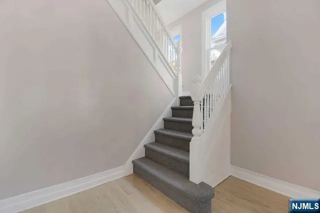 a view of entryway with stairs