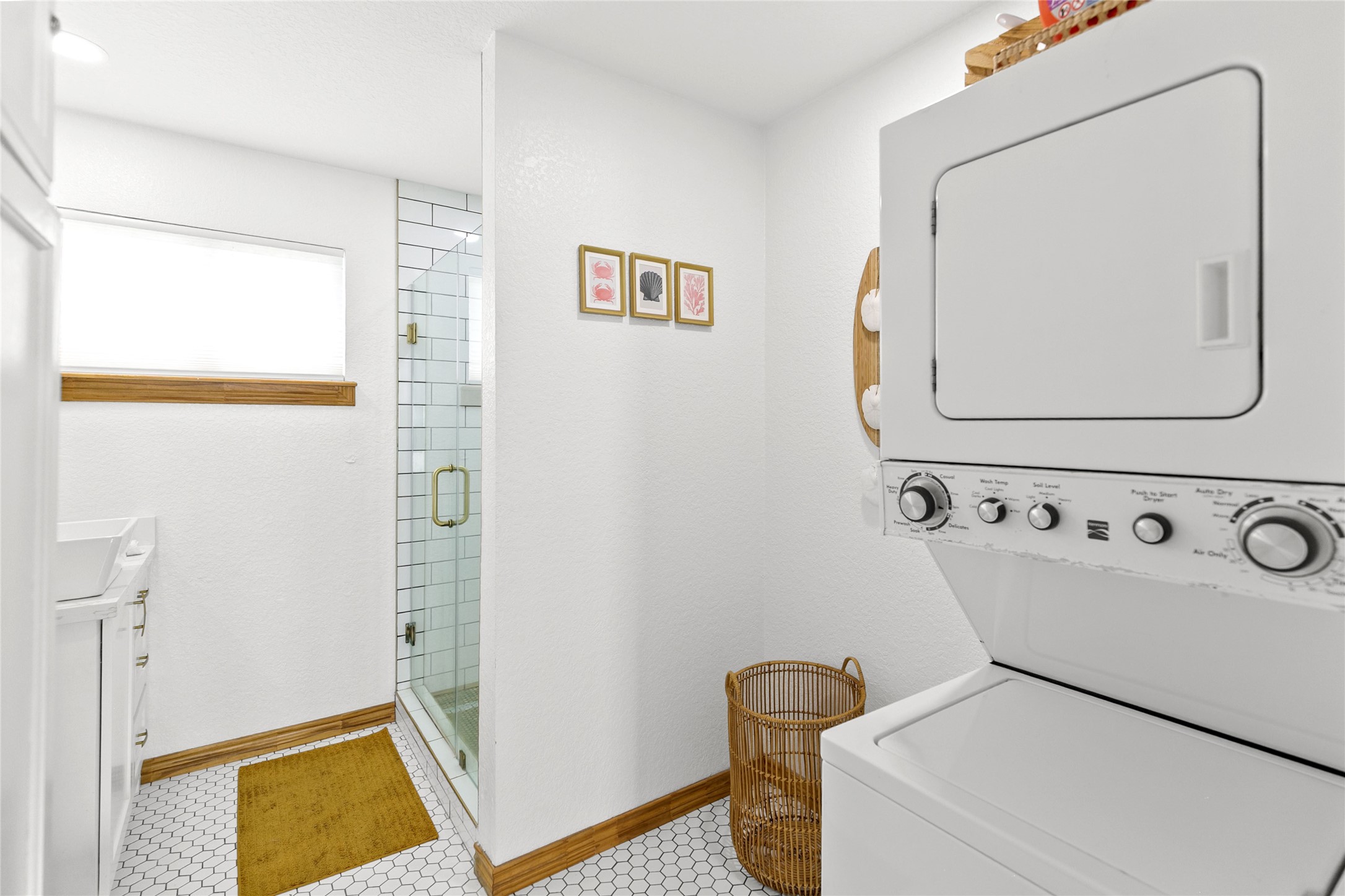 902 Beach Drive Surfside Beach, TX 77541 - Photo 12 of 22 a bathroom with a sink and a mirror