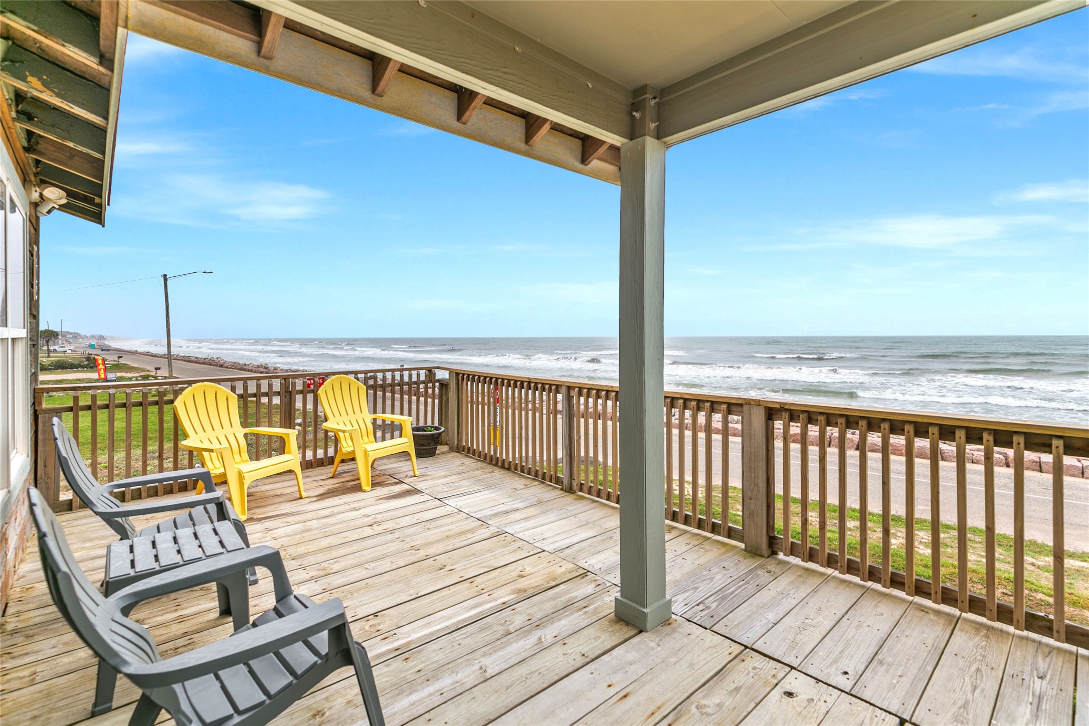 902 Beach Drive Surfside Beach, TX 77541 - Photo 14 of 22 a view of a balcony with wooden floor