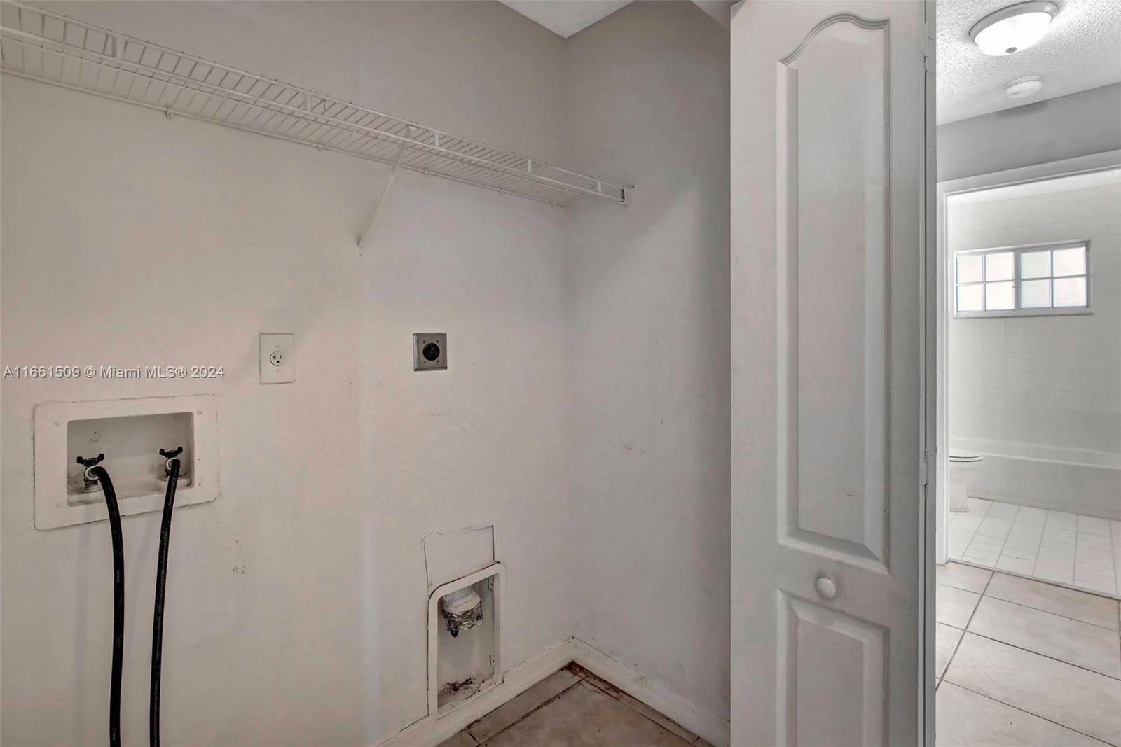 2527 West 76th Street, Unit 208 Hialeah, FL 33016 - Photo 8 of 37 a view of a hallway with closet