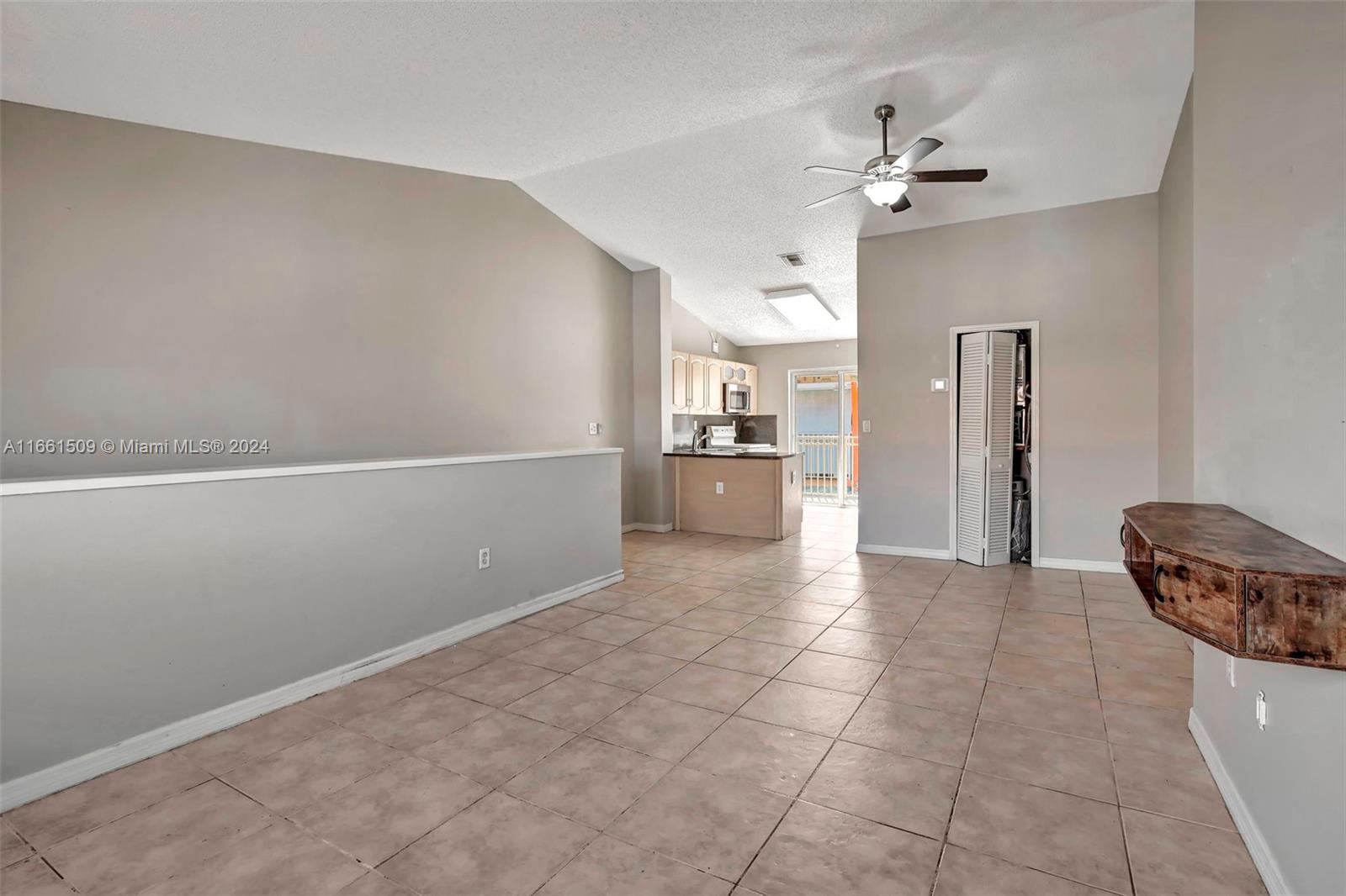 2527 West 76th Street, Unit 208 Hialeah, FL 33016 - Photo 10 of 37 a view of livingroom with furniture