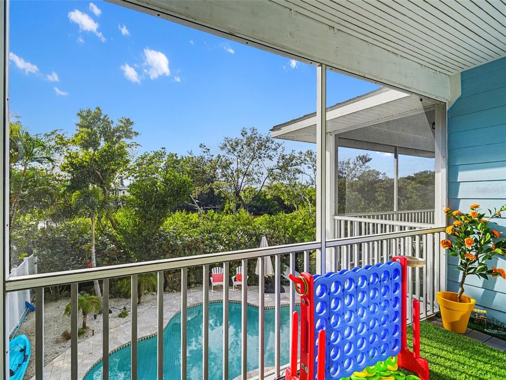 129 Hammock Road Anna Maria, FL 34216 - Photo 24 of 52 a view of a two chairs in the roof deck