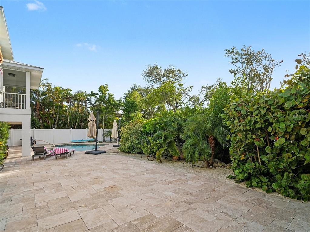 129 Hammock Road Anna Maria, FL 34216 - Photo 42 of 52 a view of a outdoor space with trees