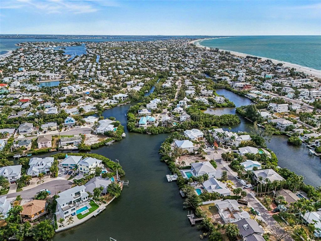 129 Hammock Road Anna Maria, FL 34216 - Photo 46 of 52 an aerial view of a city with ocean view