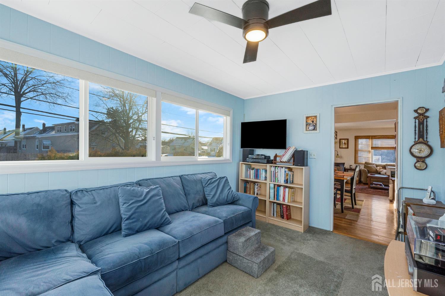 241 Cook Avenue Middlesex, NJ 08846 - Photo 13 of 33 a living room with furniture and a flat screen tv