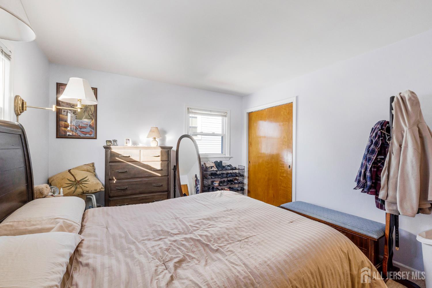 241 Cook Avenue Middlesex, NJ 08846 - Photo 14 of 33 a bedroom with a bed and a lamp