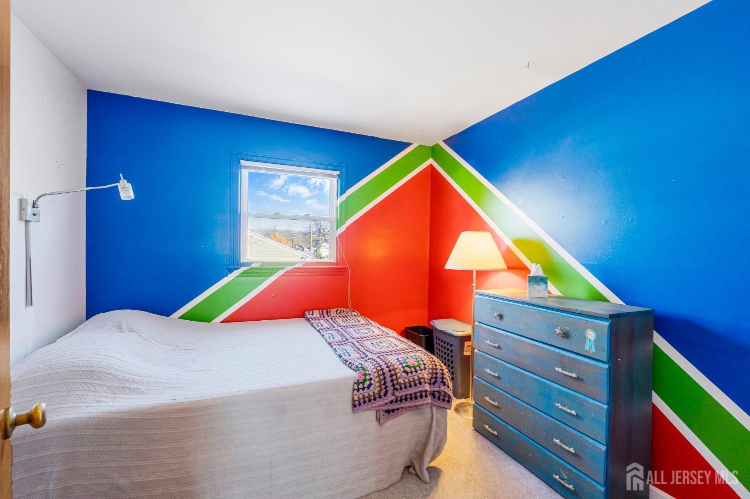 241 Cook Avenue Middlesex, NJ 08846 - Photo 19 of 33 a bedroom with a bed and a window