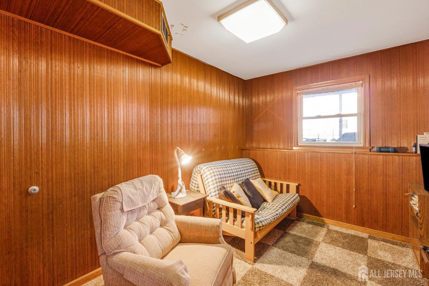 241 Cook Avenue Middlesex, NJ 08846 - Photo 22 of 33 a living room with furniture and a window
