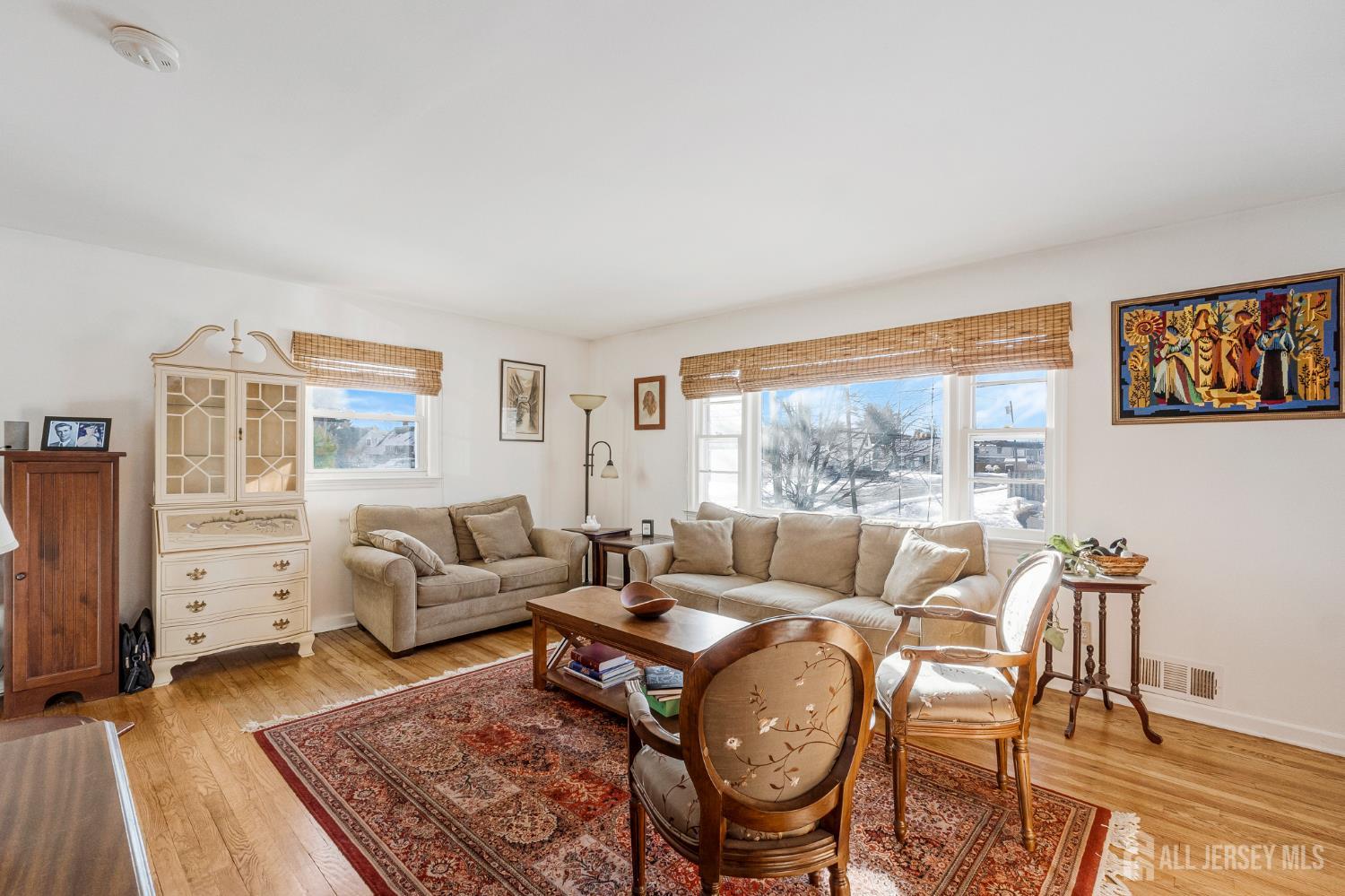 241 Cook Avenue Middlesex, NJ 08846 - Photo 4 of 33 a living room with furniture and a table