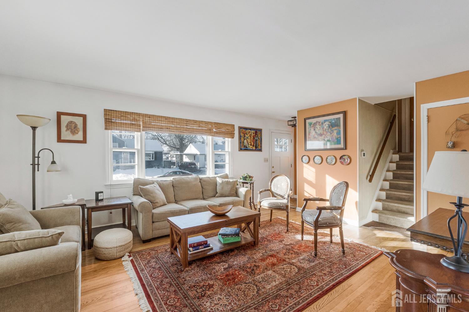 241 Cook Avenue Middlesex, NJ 08846 - Photo 5 of 33 a living room with furniture and a table
