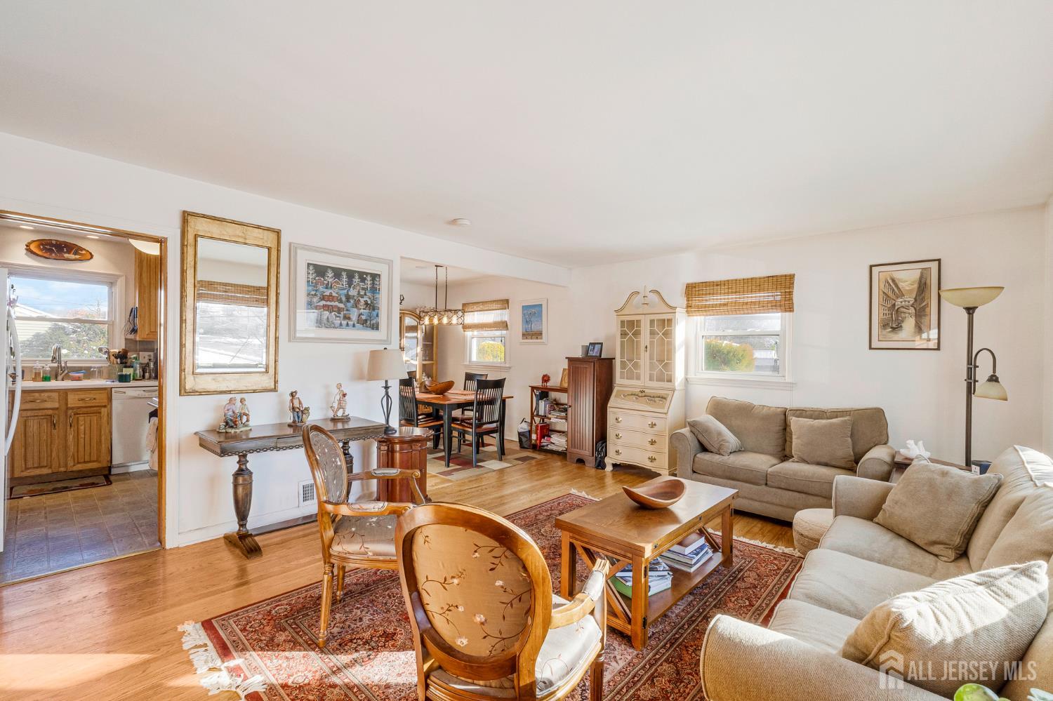 241 Cook Avenue Middlesex, NJ 08846 - Photo 6 of 33 a living room with furniture and wooden floor