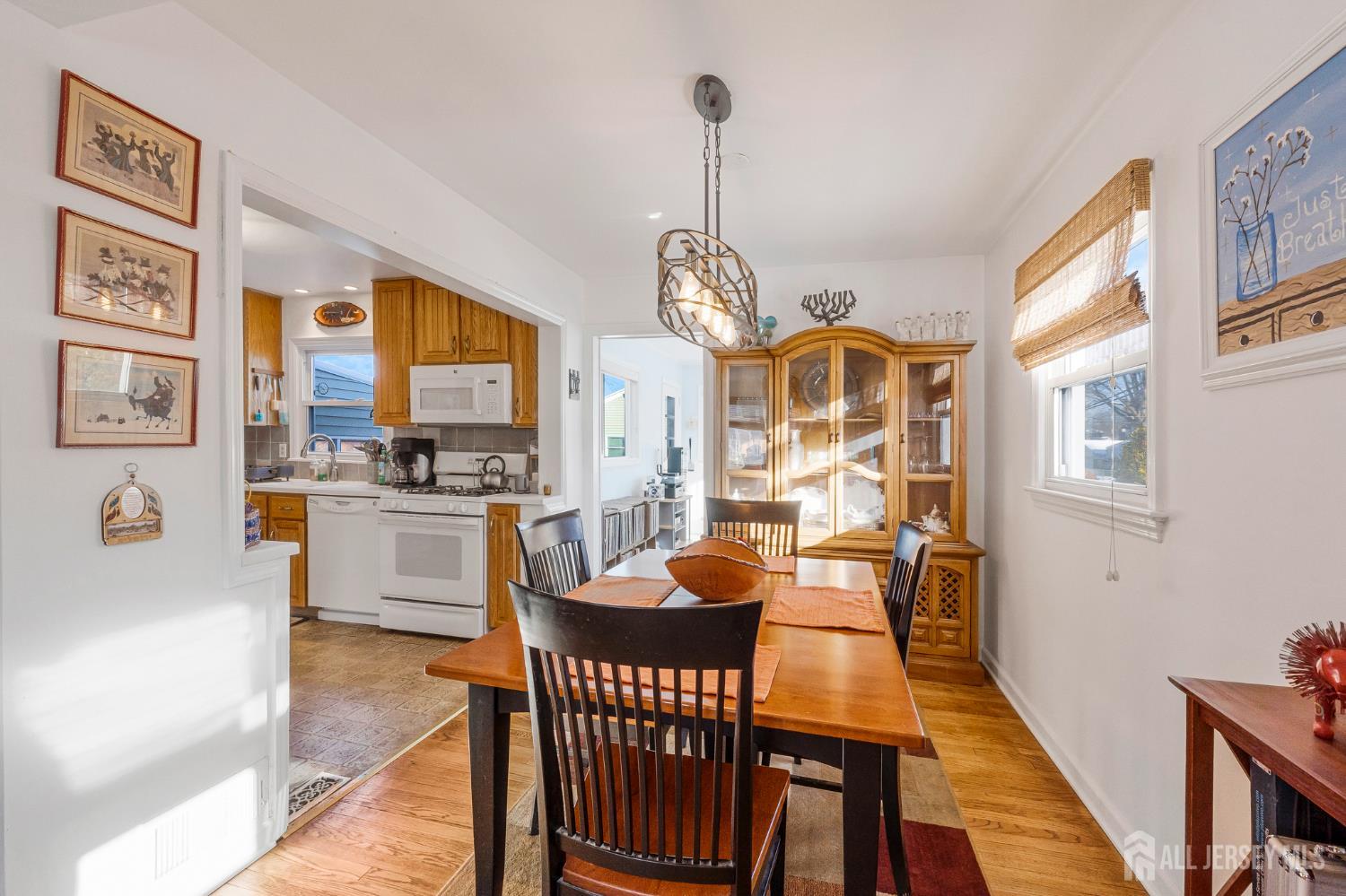 241 Cook Avenue Middlesex, NJ 08846 - Photo 7 of 33 a view of a dining room with furniture window and wooden floor