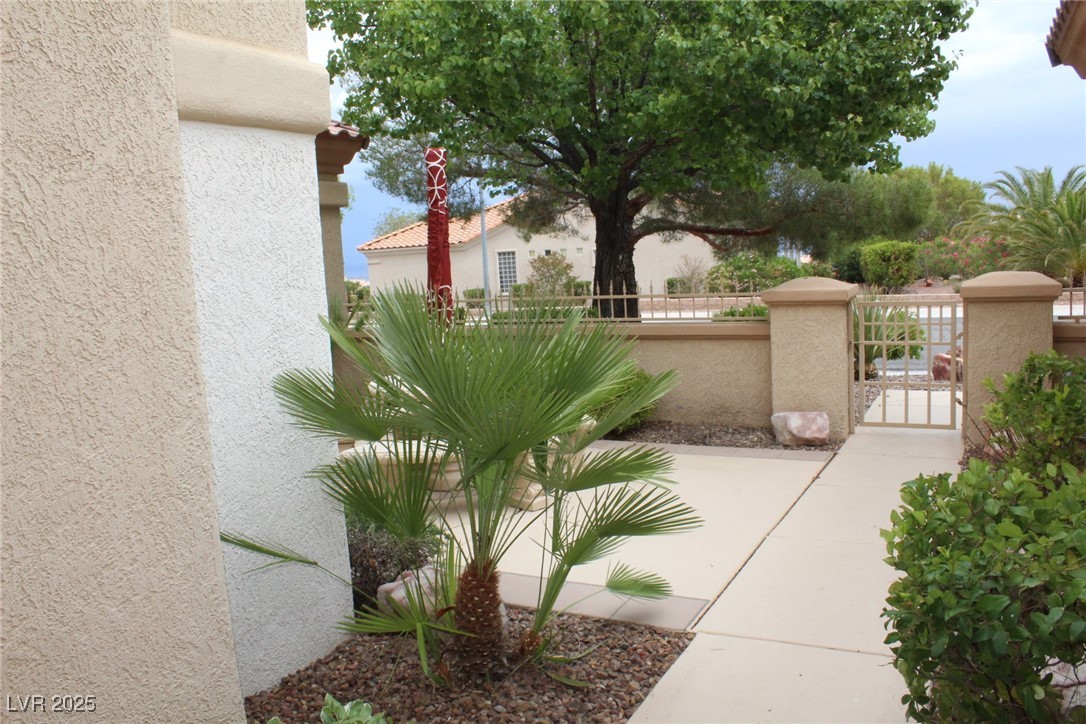 2013 Capestone Street Las Vegas, NV 89134 - Photo 18 of 40 View of gate with a fenced front yard