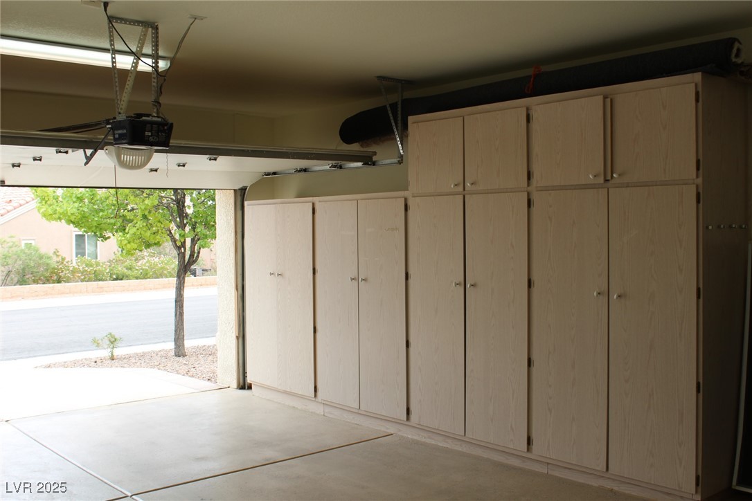2013 Capestone Street Las Vegas, NV 89134 - Photo 21 of 40 Garage with a garage door opener