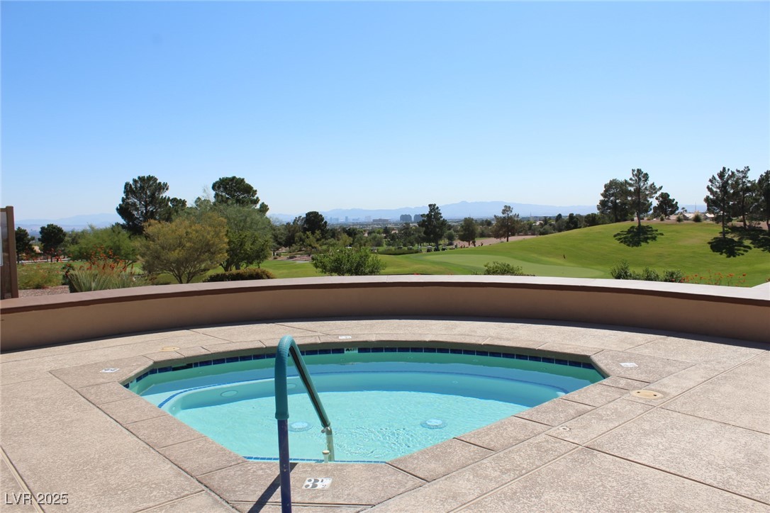 2013 Capestone Street Las Vegas, NV 89134 - Photo 32 of 40 View of pool with a yard, view of golf course, and