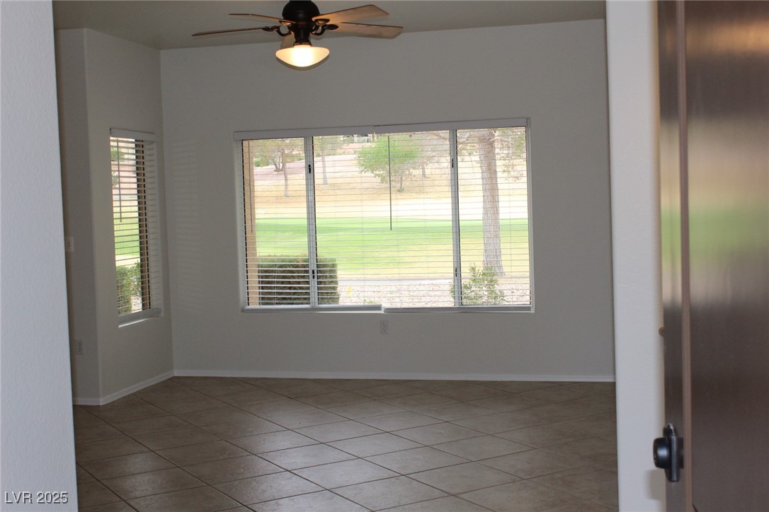 2013 Capestone Street Las Vegas, NV 89134 - Photo 4 of 40 Spare room with light tile patterned floors, baseb