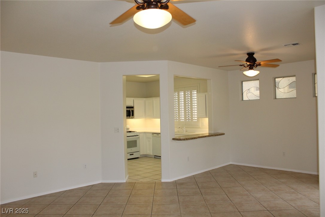 2013 Capestone Street Las Vegas, NV 89134 - Photo 7 of 40 Unfurnished living room featuring visible vents, b