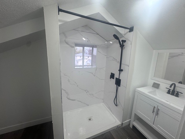 733 West Prairie Street Pontiac, IL 61764 - Photo 25 of 32 a bathroom with a granite countertop sink a toilet and shower