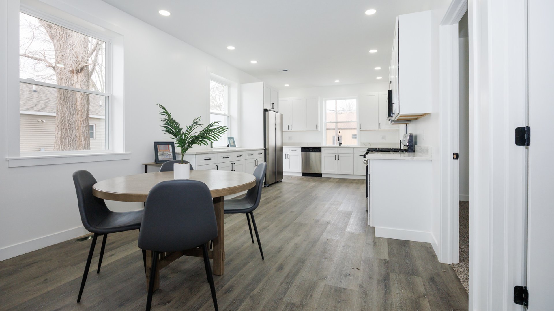 733 West Prairie Street Pontiac, IL 61764 - Photo 9 of 32 a view of kitchen with furniture and wooden floor
