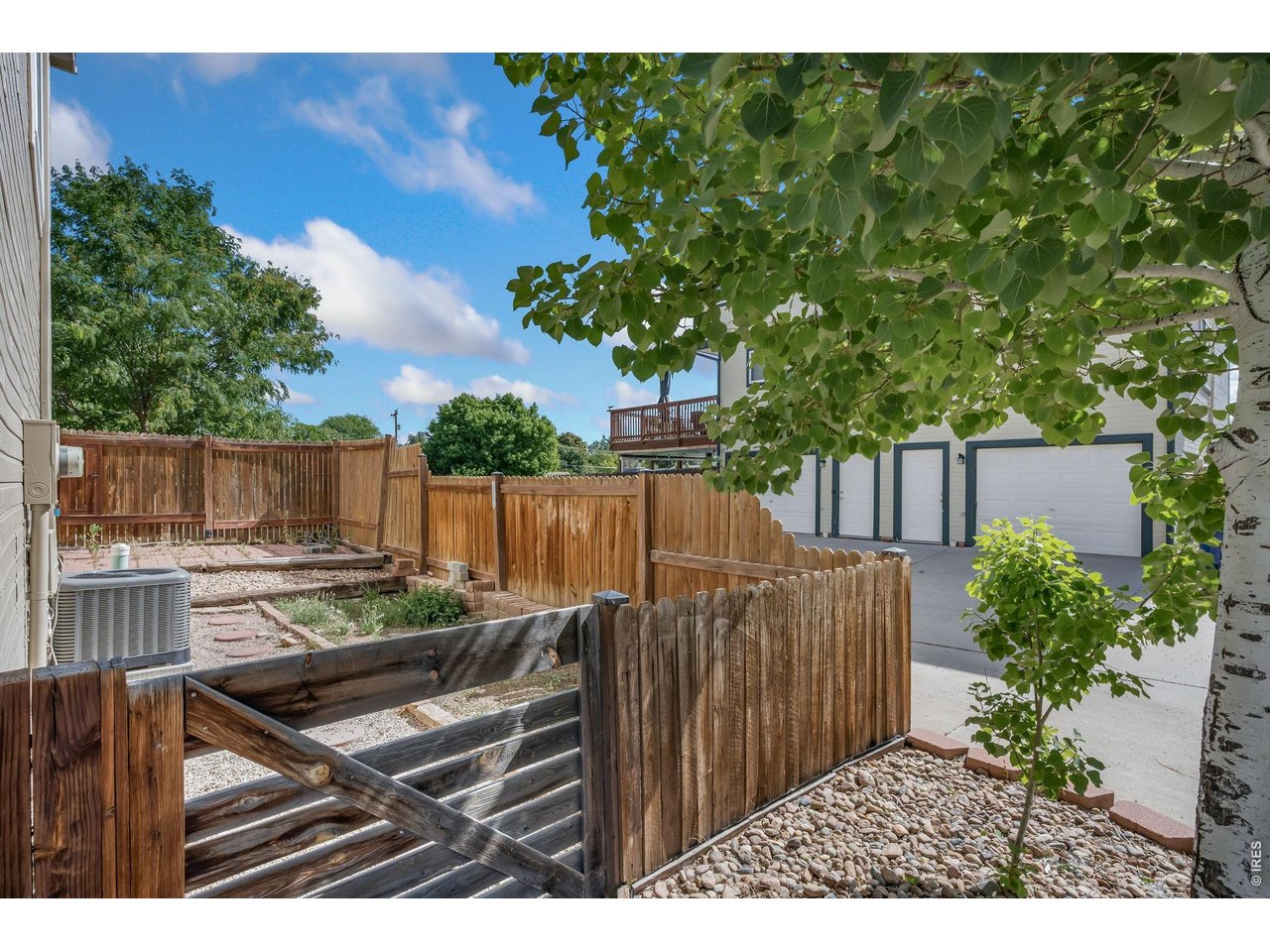 160 7th Street Frederick, CO 80530 - Photo 19 of 22 Fenced Side Yard + Patio