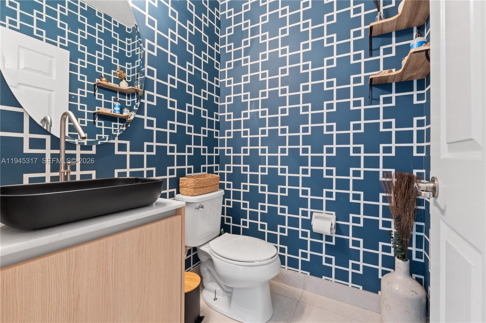 17619 Southwest 153rd Path Miami, FL 33187 - Photo 12 of 35 a bathroom with a toilet and a shower