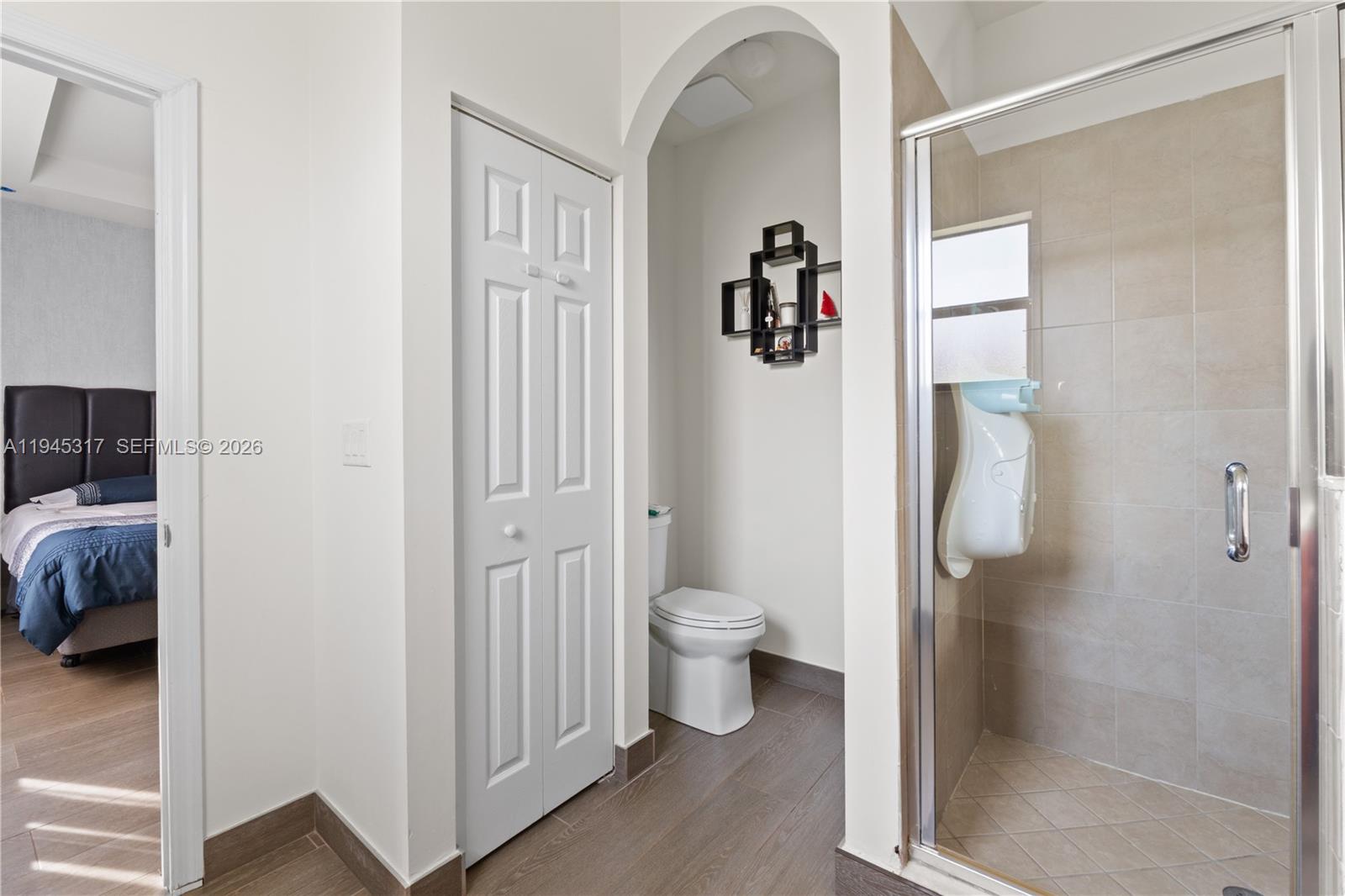 17619 Southwest 153rd Path Miami, FL 33187 - Photo 15 of 35 a bathroom with a granite countertop shower and a toilet