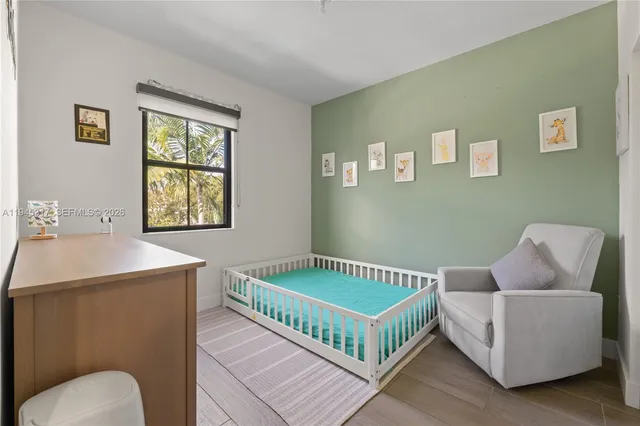 a living room with a bed and a couch