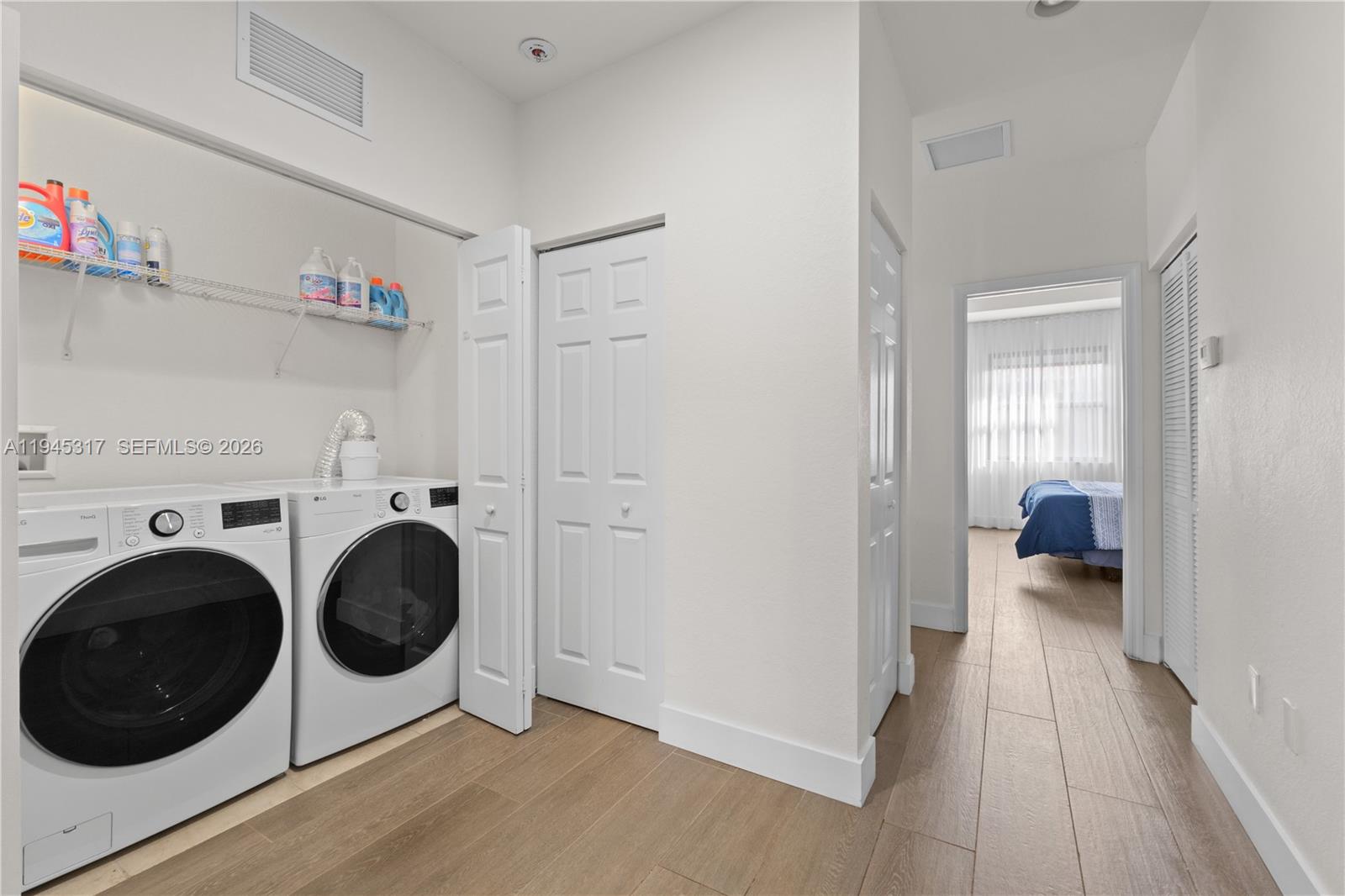 17619 Southwest 153rd Path Miami, FL 33187 - Photo 21 of 35 a utility room with dryer and washer