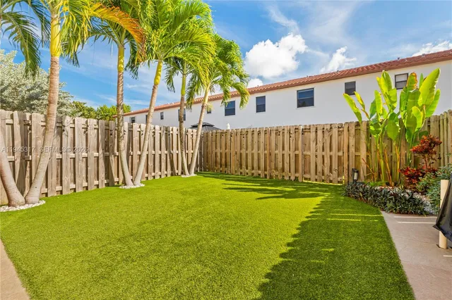 a view of a backyard with a garden