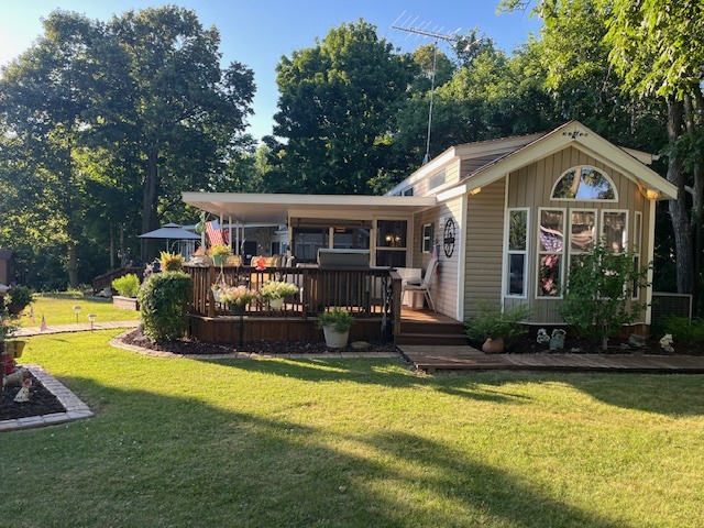 2795 East 28th Road Marseilles, IL 61341 - Photo 11 of 79 a view of a house with swimming pool and porch