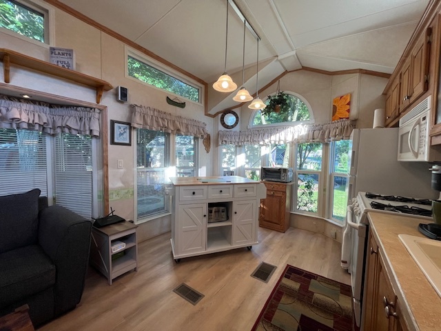 2795 East 28th Road Marseilles, IL 61341 - Photo 14 of 79 a kitchen with stainless steel appliances granite countertop a stove and a refrigerator