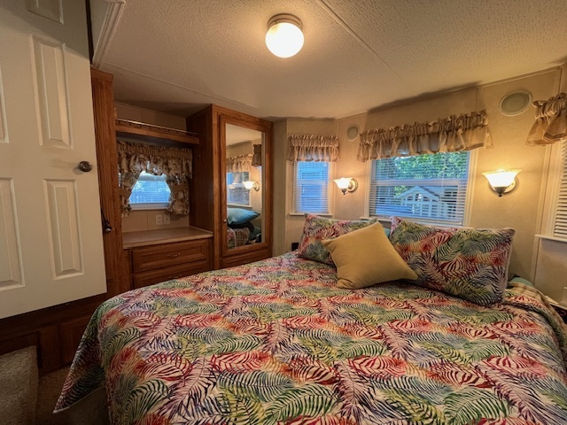 2795 East 28th Road Marseilles, IL 61341 - Photo 18 of 79 a bedroom with a large bed and a window